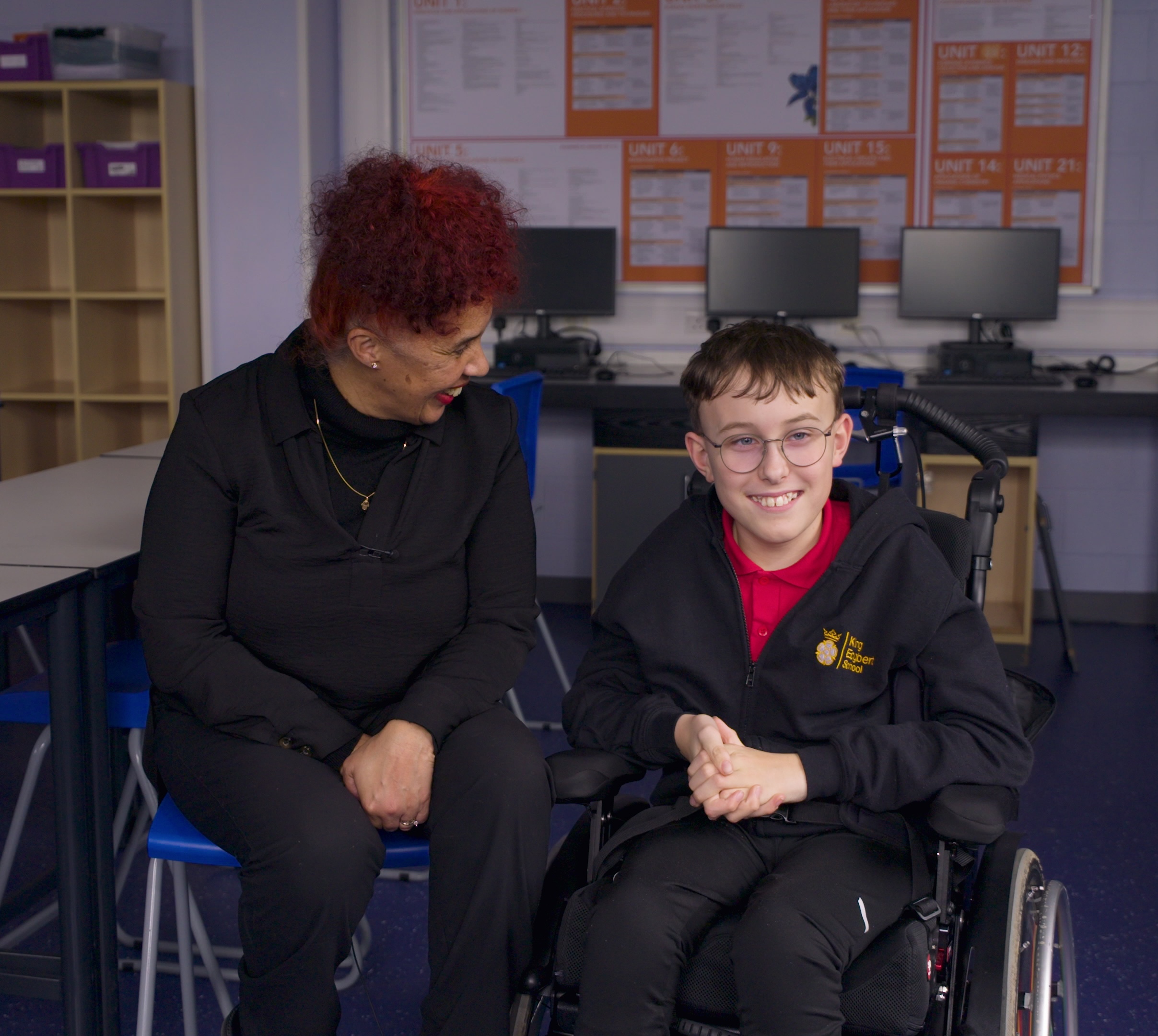 Child in a wheelchair and Learning Support Assistant